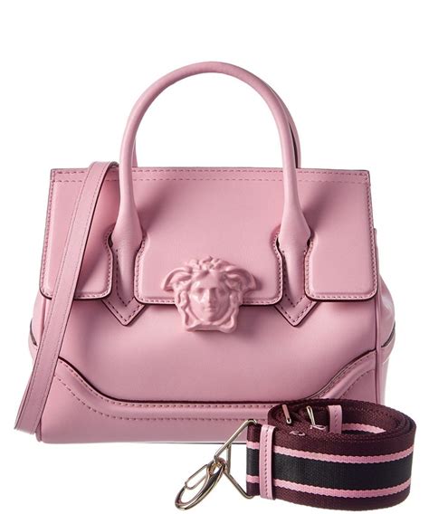 hot pink versace bag.